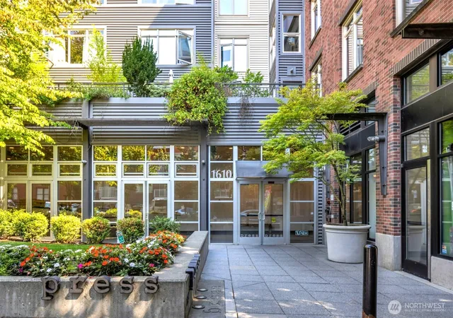 Photo 1 of Condo for sale at 1610 Belmont Ave #407, Seattle, WA 98122 | MLS# NWM2509675 | Listing updated on 2026-09-21
