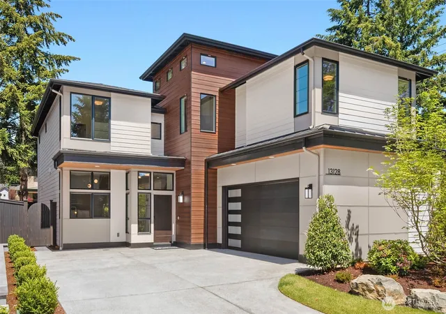 Photo 2 of Single family home for sale at 13128 Ne 103rd Place, Kirkland, WA 98033 | MLS# NWM2509676 | Listing updated on 2026-09-21