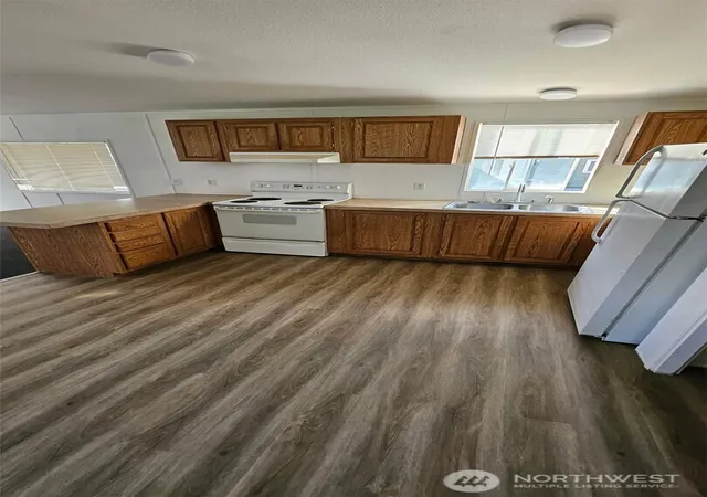 Photo 2 of Manufactured home for sale at 5705 Litterock Rd Sw #32, Tumwater, WA 98512 | MLS# NWM2510363 | Listing updated on 2026-09-21