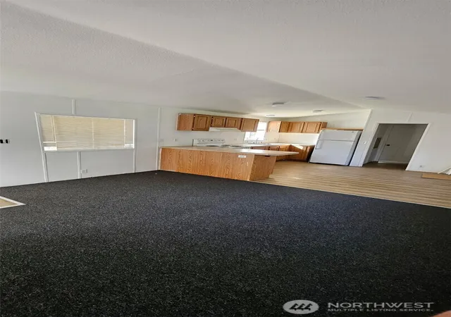 Photo 3 of Manufactured home for sale at 5705 Litterock Rd Sw #32, Tumwater, WA 98512 | MLS# NWM2510363 | Listing updated on 2026-09-21