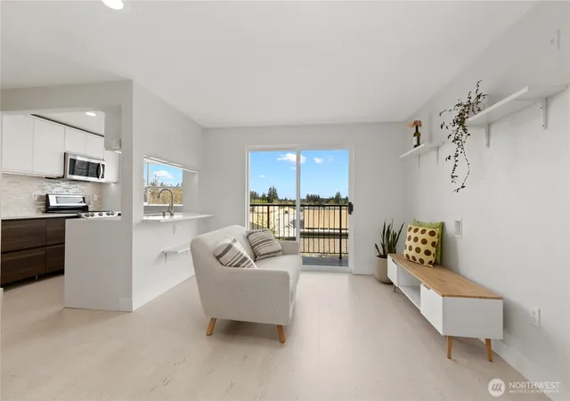 Photo 3 of Condo for sale at 12056 15th Avenue NE #404, Seattle, WA 98125 | MLS# NWM2511893 | Listing updated on 2026-09-21