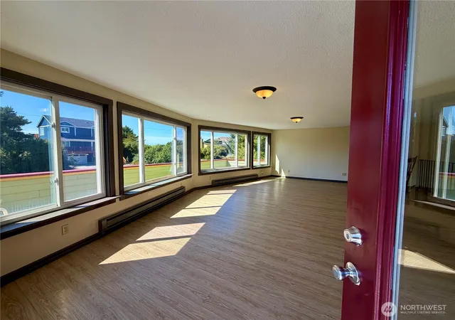 Photo 2 of Single family home for sale at 334 Sand Dune Ave Nw, Ocean Shores, WA 98569 | MLS# NWM2512307 | Listing updated on 2026-09-21
