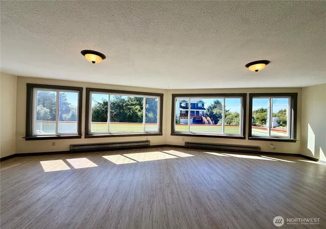 Photo 3 of Single family home for sale at 334 Sand Dune Ave Nw, Ocean Shores, WA 98569 | MLS# NWM2512307 | Listing updated on 2026-09-21