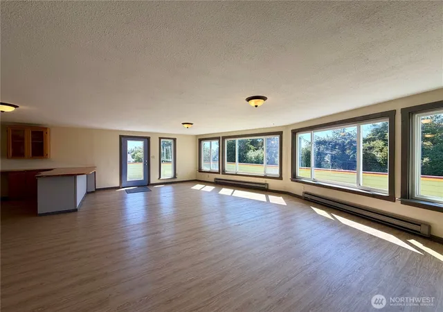 Photo 3 of Single family home for sale at 334 Sand Dune Ave NW, Ocean Shores, WA 98569 | MLS# NWM2512307 | Listing updated on 2026-09-21