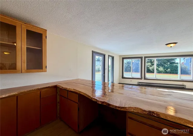 Photo 4 of Single family home for sale at 334 Sand Dune Ave NW, Ocean Shores, WA 98569 | MLS# NWM2512307 | Listing updated on 2026-09-21