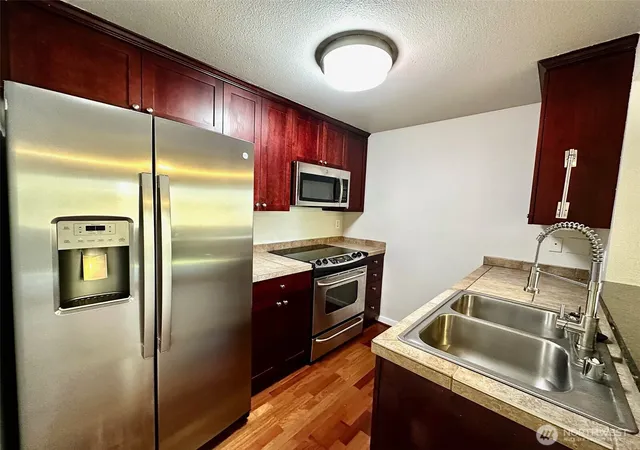 Photo 4 of Condo for sale at 1808 S 284th Lane #E203, Federal Way, WA 98003 | MLS# NWM2514331 | Listing updated on 2026-09-21