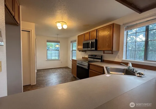 Photo 3 of Sale Pending at 23960 58th Court #D-1, Kent, WA 98032 | MLS# NWM2515572 | Listing updated on 2026-09-02