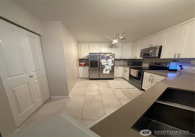 Photo 2 of Condo for sale at 1500 S 18th Street #D201, Renton, WA 98055 | MLS# NWM2517363 | Listing updated on 2026-09-21