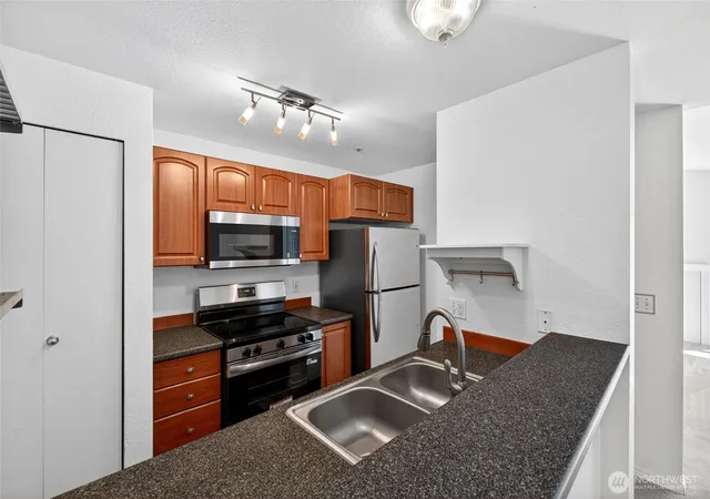 Photo 2 of Condo for sale at 19230 Forest Park Dr NE #A201, Lake Forest Park, WA 98155 | MLS# NWM2519280 | Listing updated on 2026-09-21
