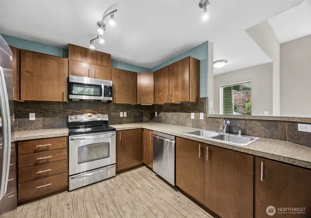 Photo 3 of Condo for sale at 21048 40th Place S #J2, Sea Tac, WA 98198 | MLS# NWM2520616 | Listing updated on 2026-09-22