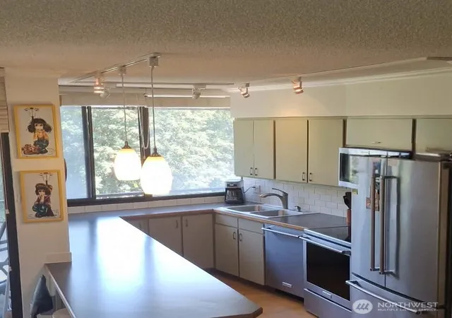 Photo 3 of Condo for sale at 1910 Evergreen Park Dr Sw #302, Olympia, WA 98502 | MLS# NWM2525324 | Listing updated on 2026-10-02