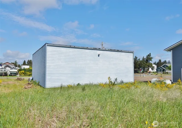 Photo 3 of Single family home for sale at 987 Beaver Ct SE, Ocean Shores, WA 98569 | MLS# NWM2525350 | Listing updated on 2026-09-21