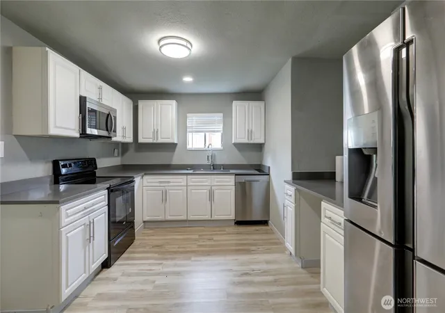 Photo 4 of Single family home for sale at 4609 S Thompson Ave, Tacoma, WA 98408 | MLS# NWM2527375 | Listing updated on 2026-09-21