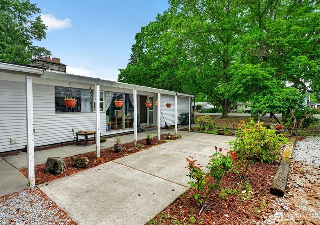 Photo 2 of Single family home for sale at 411 Tule Lake Rd S, Tacoma, WA 98444 | MLS# NWM2528002 | Listing updated on 2026-09-21