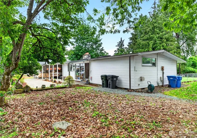Photo 3 of Single family home for sale at 411 Tule Lake Rd S, Tacoma, WA 98444 | MLS# NWM2528002 | Listing updated on 2026-09-21