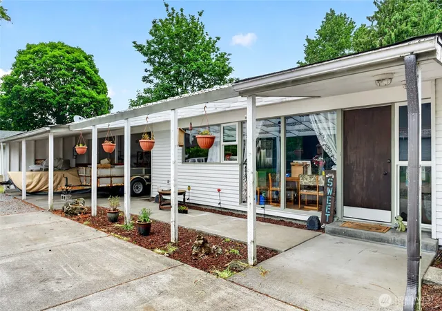 Photo 3 of Single family home for sale at 411 Tule Lake Rd S, Tacoma, WA 98444 | MLS# NWM2528002 | Listing updated on 2026-09-21