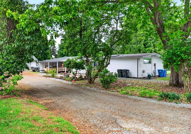 Photo 4 of Single family home for sale at 411 Tule Lake Rd S, Tacoma, WA 98444 | MLS# NWM2528002 | Listing updated on 2026-09-21