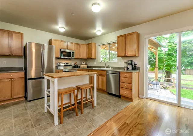 Photo 3 of Single family home for sale at 21648 SE 297th Terrace, Kent, WA 98042 | MLS# NWM2529590 | Listing updated on 2026-09-22