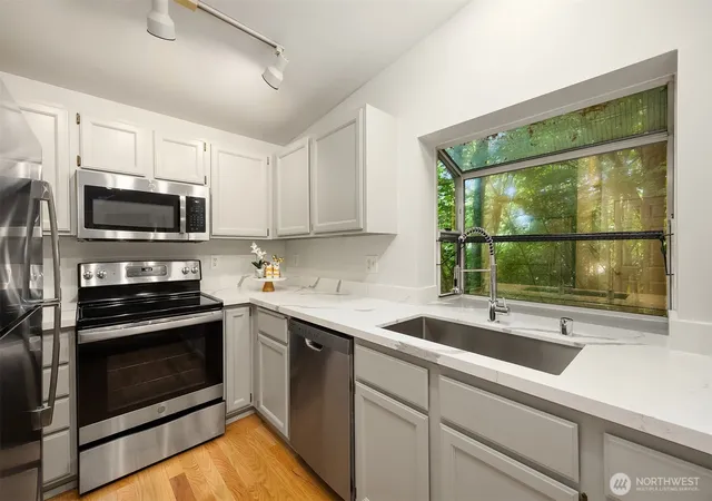 Photo 3 of Condo for sale at 12323 NE 97th Street #M, Kirkland, WA 98033 | MLS# NWM2530737 | Listing updated on 2026-09-21