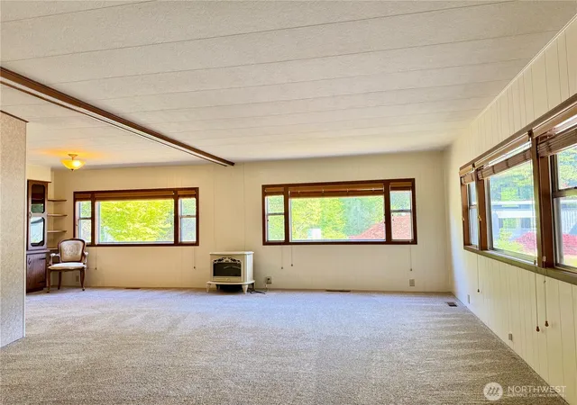 Photo 3 of Manufactured home for sale at 10414 Peacock Hl Ave #19, Gig Harbor, WA 98332 | MLS# NWM2530911 | Listing updated on 2026-09-21