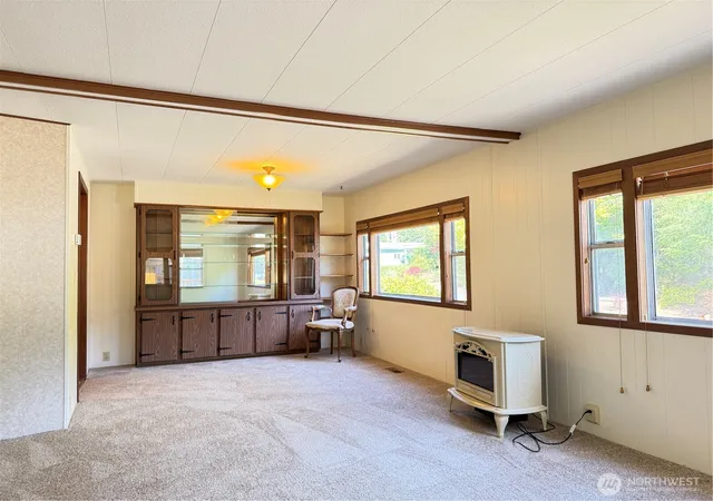 Photo 3 of Manufactured home for sale at 10414 Peacock Hl Ave #19, Gig Harbor, WA 98332 | MLS# NWM2530911 | Listing updated on 2026-09-21