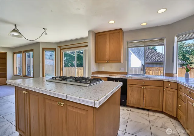 Photo 4 of Single family home for sale at 14542 SE 243rd Place, Kent, WA 98042 | MLS# NWM2531673 | Listing updated on 2026-09-21
