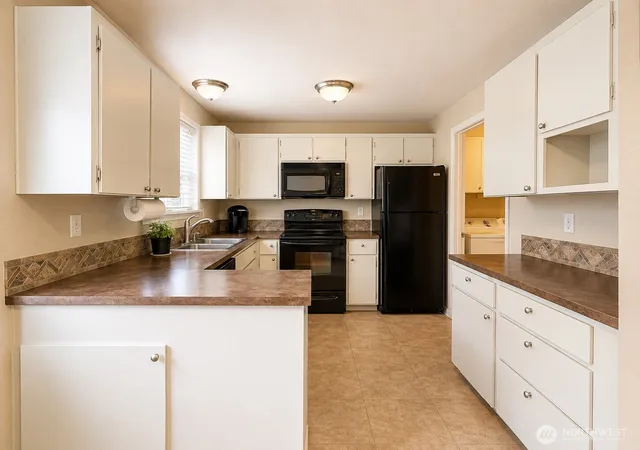 Photo 4 of Condo for sale at 12002 113th Avenue Ct E #31, Puyallup, WA 98374 | MLS# NWM2532549 | Listing updated on 2026-09-21