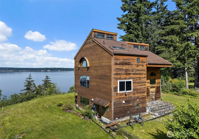 Photo 1 of Single family home for sale at 7544 Sandy Point Beach Rd Ne, Olympia, WA 98516 | MLS# NWM2533967 | Listing updated on 2026-09-21