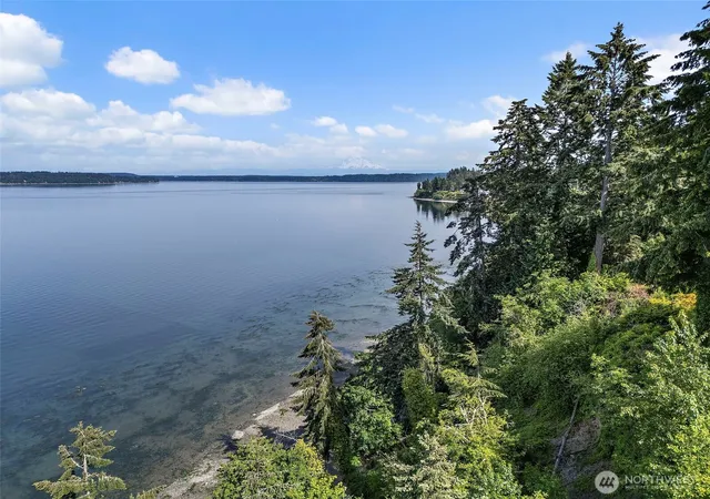 Photo 3 of Single family home for sale at 7544 Sandy Point Beach Rd Ne, Olympia, WA 98516 | MLS# NWM2533967 | Listing updated on 2026-09-21