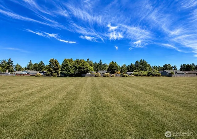 Photo 2 of Single family home for sale at 214 Canal Dr Ne, Ocean Shores, WA 98569 | MLS# NWM2535815 | Listing updated on 2026-09-21