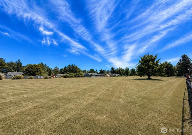 Photo 3 of Single family home for sale at 214 Canal Dr Ne, Ocean Shores, WA 98569 | MLS# NWM2535815 | Listing updated on 2026-09-21