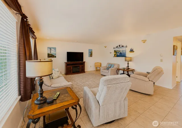 Photo 3 of Single family home for sale at 214 Canal Dr NE, Ocean Shores, WA 98569 | MLS# NWM2535815 | Listing updated on 2026-09-21