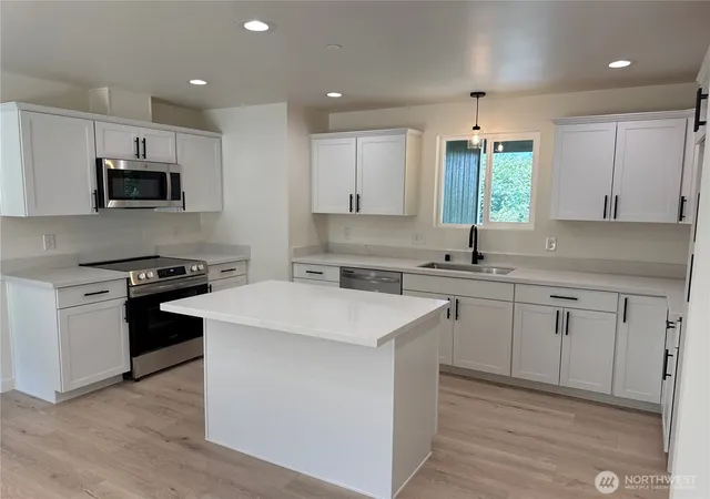 Photo 2 of Single family home for sale at 7828 E Jessica Way, Port Orchard, WA 98366 | MLS# NWM2535850 | Listing updated on 2026-09-22