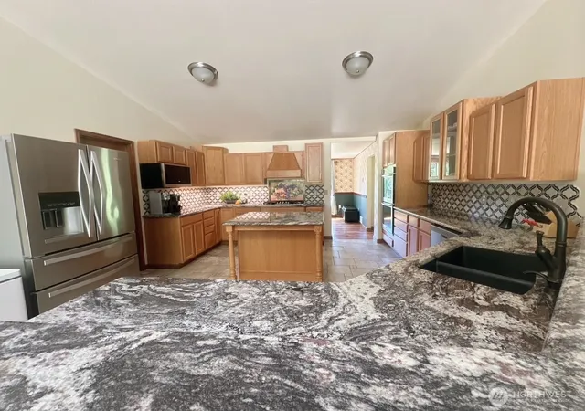 Photo 4 of Single family home for sale at 8205 Hide A Way Ln NW, Silverdale, WA 98383 | MLS# NWM2536120 | Listing updated on 2026-10-28