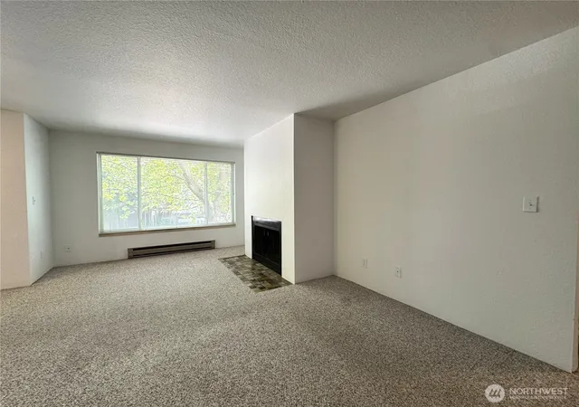 Photo 3 of Condo for sale at 555 N 105th Street #202, Seattle, WA 98133 | MLS# NWM2536344 | Listing updated on 2026-10-01