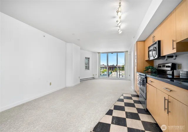 Photo 3 of Condo for sale at 1100 106th Avenue NE #609, Bellevue, WA 98004 | MLS# NWM2536413 | Listing updated on 2026-10-02