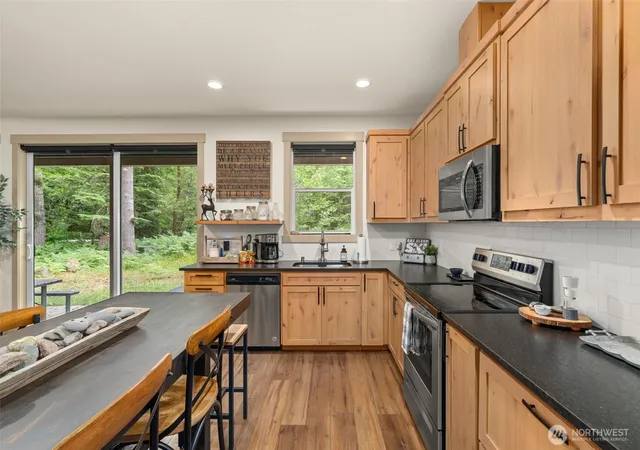 Photo 3 of Single family home for sale at 128 Riverdance Ln, Packwood, WA 98361 | MLS# NWM2536569 | Listing updated on 2026-09-21