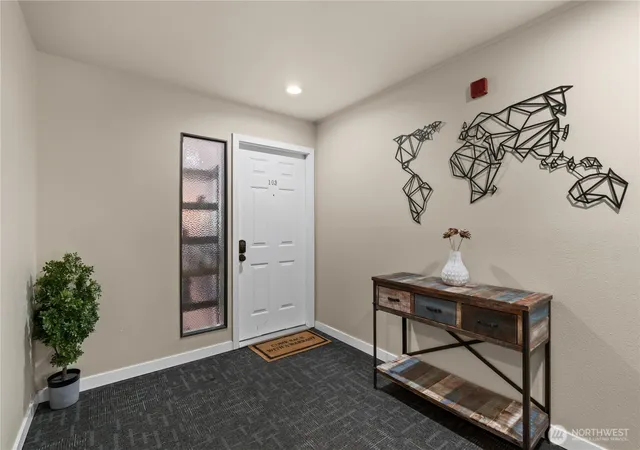Photo 4 of Condo for sale at 613 4th Avenue W #103, Seattle, WA 98119 | MLS# NWM2537702 | Listing updated on 2026-09-22
