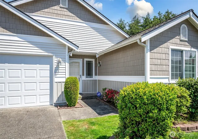 Photo 1 of Condo for sale at 11809 5th Avenue Ct E, Tacoma, WA 98445 | MLS# NWM2538158 | Listing updated on 2026-10-01