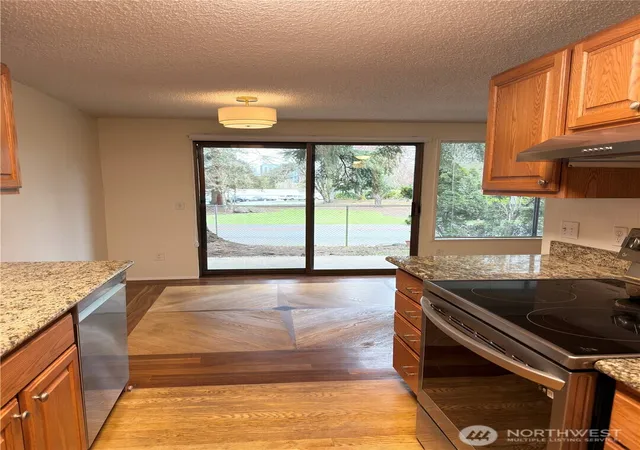 Photo 1 of Condo for sale at 12510 Ne 117th Place #B3, Kirkland, WA 98034 | MLS# NWM2540251 | Listing updated on 2026-09-24