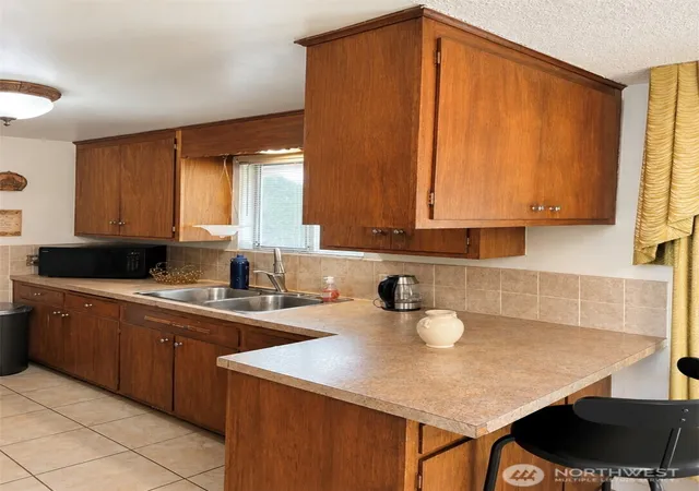 Photo 4 of Sale Pending at 5919 19th Avenue S, Seattle, WA 98108 | MLS# NWM2540784 | Listing updated on 2026-09-21