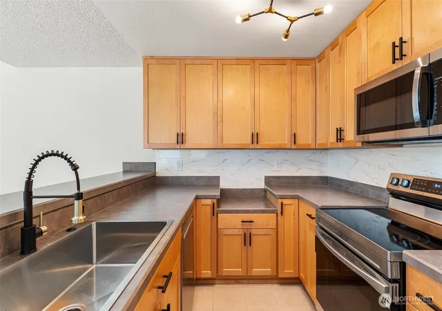 Photo 3 of Condo for sale at 4415 145th Avenue NE #H6, Bellevue, WA 98007 | MLS# NWM2541452 | Listing updated on 2026-09-23