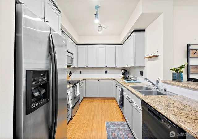Photo 3 of Condo for sale at 1501 Tacoma Ave S #311, Tacoma, WA 98402 | MLS# NWM2542222 | Listing updated on 2026-09-21