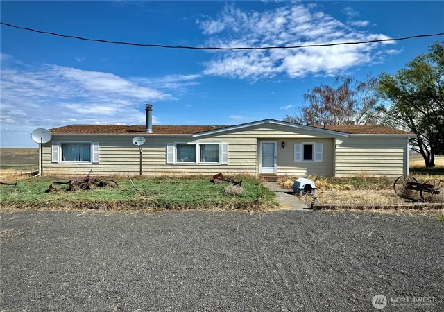 Photo 1 of Manufactured home for sale at 7603 Coyote Hts Rd N, Odessa, WA 99159 | MLS# NWM2543419 | Listing updated on 2026-09-26