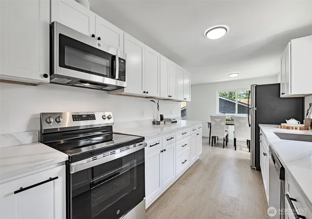 Photo 3 of Single family home for sale at 6325 S Eddy Ct, Seattle, WA 98118 | MLS# NWM2545601 | Listing updated on 2026-09-22