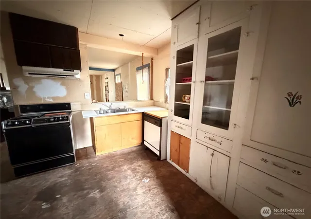 Photo 3 of Single family home for sale at 1308 Juniper St, Oroville, WA 98844 | MLS# NWM2547387 | Listing updated on 2026-09-22