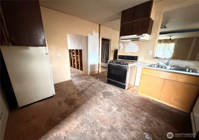 Photo 3 of Single family home for sale at 1308 Juniper St, Oroville, WA 98844 | MLS# NWM2547387 | Listing updated on 2026-09-22