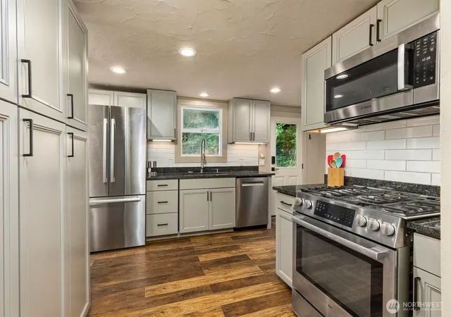 Photo 3 of Single family home for sale at 8233 NE 169th Street, Kenmore, WA 98028 | MLS# NWM2548080 | Listing updated on 2026-09-23