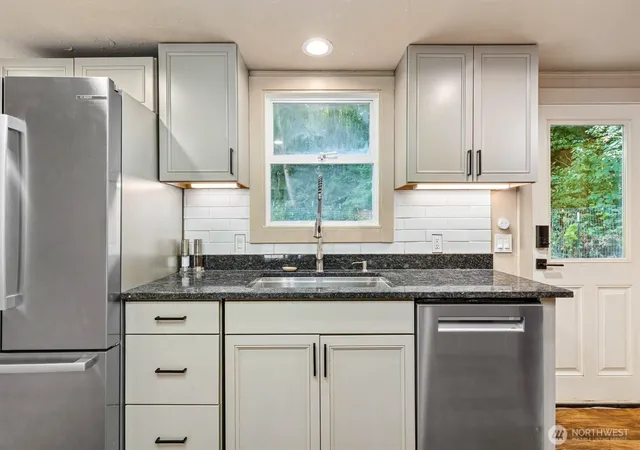 Photo 4 of Single family home for sale at 8233 NE 169th Street, Kenmore, WA 98028 | MLS# NWM2548080 | Listing updated on 2026-09-23