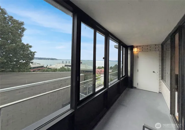 Photo 4 of Condo for sale at 521 5th Avenue W #201, Seattle, WA 98119 | MLS# NWM2548940 | Listing updated on 2026-09-22